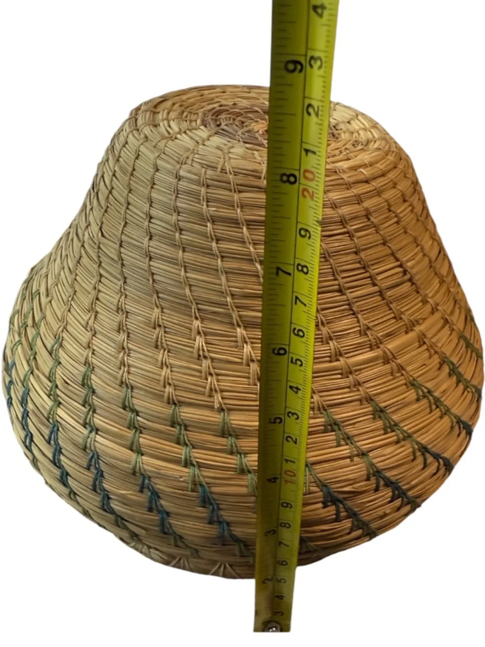 vintage Native American style pine needle basket, similar to those identified
